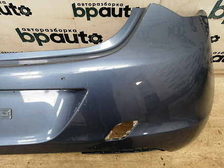 AA037285; Бампер задний; без паркт. (13266587) для Opel Astra J HB 5D (2010 - 2012)/БУ; Оригинал; Р1, Мелкий дефект; 