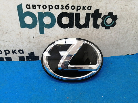 Фотография детали AA027313; Эмблема решетки радиатора (90975-02133) для Lexus/БУ; Оригинал; Р0, Хорошее; . Фото номер 1