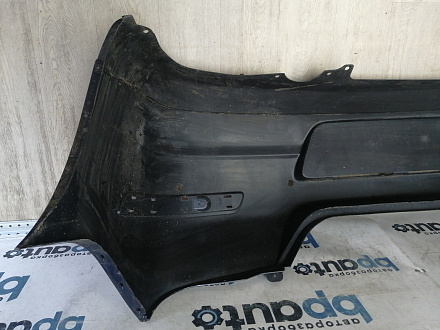 AA046502; Бампер задний; под паркт. (85022-EM00H) для Nissan Tiida/БУ; Оригинал; Р1, Мелкий дефект; 