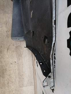 AA037280; Бампер задний, левая часть; без паркт. (6410A291) для Mitsubishi Pajero/БУ; Оригинал; Р1, Мелкий дефект; 