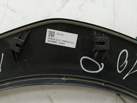 Фотография детали AA030852; Накладка крыла передняя правая, расширитель (91112-FL120) для Subaru XV/БУ; Оригинал; Р2, Удовлетворительное; . Фото номер 13
