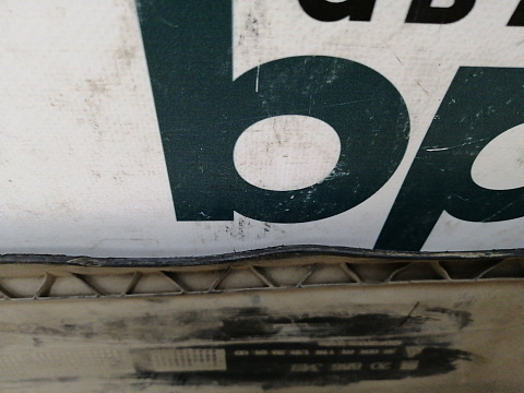 Фотография детали AA011096; Юбка заднего бампера, большой вырез под выхл.трубу; под паркт. (20886349) для Opel Astra J рест. Sedan (2012 - 2015)/БУ; Оригинал; Р1, Мелкий дефект; . Фото номер 9