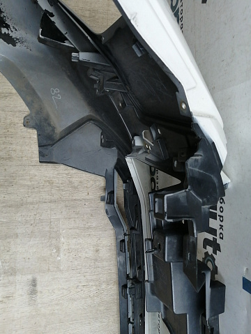 Фотография детали AA045834; Бампер передний; без паркт.; без омыват. (6400J511ZZ) для Mitsubishi Pajero Sport III рест. (2019-н.в.)/БУ; Оригинал; Р2, Удовлетворительное; . Фото номер 18