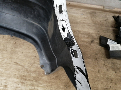 Фотография детали AA036121; Бампер задний; под паркт. (85022-EM00H) для Nissan Tiida/БУ; Оригинал; Р1, Мелкий дефект; . Фото номер 10