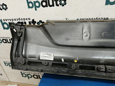 AA036210; Накладка на крышку багажника нижняя (BM51-N425A30A) для Ford Focus/БУ; Оригинал; Р2, Удовлетворительное; 
