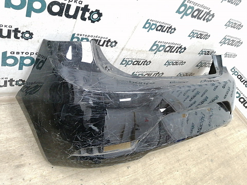 Фотография детали AA023209; Бампер задний; без паркт. (86611-4Y200) для Kia Rio III HB (2011- 2015)/БУ; Оригинал; Р2, Удовлетворительное; . Фото номер 2