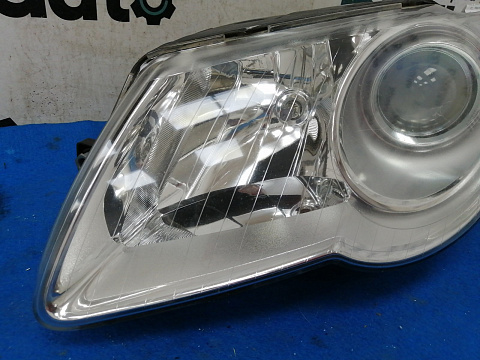 Фотография детали AA025023; Фара галоген левая (3C0941005S) для Volkswagen Passat/БУ; Оригинал; Р1, Мелкий дефект; . Фото номер 3