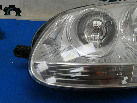 AA025066; Фара галоген левая, Светлый отраж. (1K6941005P) для Volkswagen/БУ; Оригинал; Р1, Мелкий дефект; 
