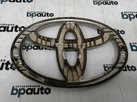 AA016159; Эмблема на крышку багажника (90975-02182) для Toyota/БУ; Оригинал; Р1, Мелкий дефект; 