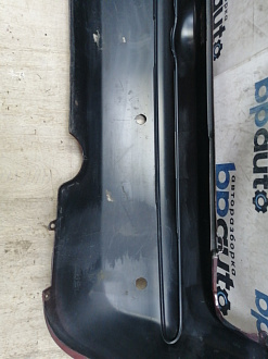 AA046072; Бампер задний, узкий молдинг; под паркт. (85022-BC640) для Nissan Micra III (K12) рест. (2007-2010)/БУ; Оригинал; Р1, Мелкий дефект; 