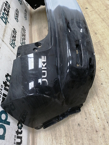 Фотография детали AA021063; Бампер задний; без паркт. (850221KA6H) для Nissan Juke I (2010-2014)/БУ; Оригинал; Р1, Мелкий дефект; . Фото номер 3