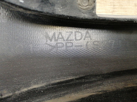 Фотография детали AA036976; Бампер передний; без паркт.; под омыват. (BP6J-50031) для Mazda 3 I (BK) Sedan (2003-2006)/БУ; Оригинал; Р2, Удовлетворительное; . Фото номер 31