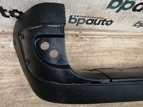 Фотография детали AA034285; Бампер задний; без паркт. (8200150631) для Renault Kangoo I рест. (2003-2008)/БУ; Оригинал; Р1, Мелкий дефект; . Фото номер 9