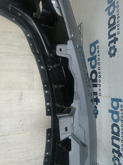 AA046010; Бампер передний; без паркт.; под омыват. (62022-BH10H) для Nissan Note I рест. (2009-2013)/БУ; Оригинал; Р1, Мелкий дефект; 