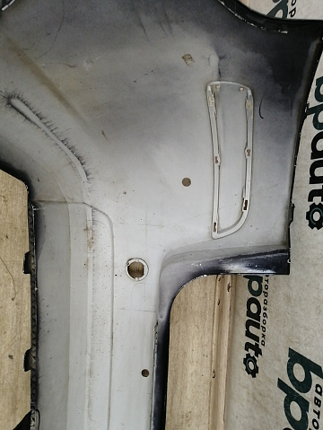 Фотография детали AA033752; Бампер задний; под паркт. (13125014) для Opel Zafira/БУ; Оригинал; Р1, Мелкий дефект; . Фото номер 19
