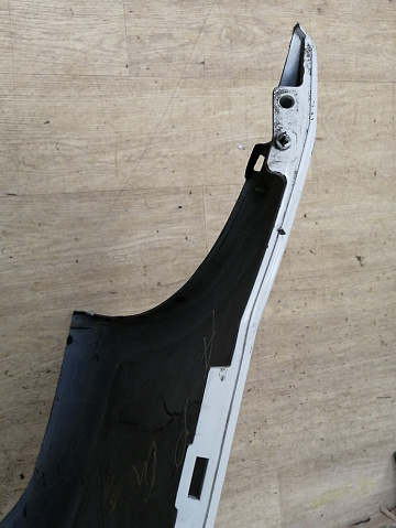 Фотография детали AA042870; Бампер задний; без паркт. (8200916804) для Renault Logan I рест. (2009-2015)/БУ; Оригинал; Р1, Мелкий дефект; . Фото номер 19