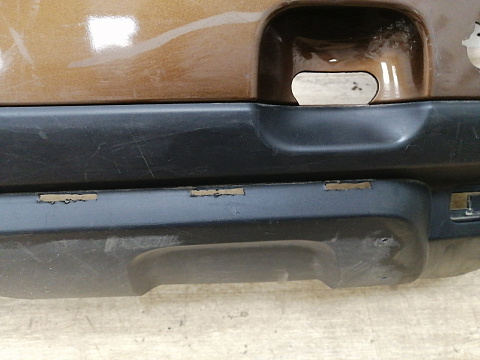Фотография детали AA032713; Бампер задний; под паркт. (850225291R) для Renault Duster I (2011-2015)/БУ; Оригинал; Р1, Мелкий дефект; . Фото номер 10