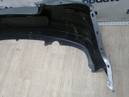 AA046021; Бампер задний; под паркт. (85022-EM00H) для Nissan Tiida/БУ; Оригинал; Р1, Мелкий дефект; 
