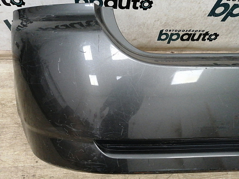 Фотография детали AA028388; Бампер задний; без паркт. (52159-02360) для Toyota Corolla 120 рест. HB (2004- 2006)/БУ; Оригинал; Р1, Мелкий дефект; . Фото номер 4