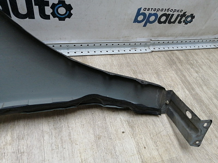 AA045205; Крыло переднее левое, без указателя поворота (EG2152210F) для Mazda CX-7/БУ; Оригинал; Р1, Мелкий дефект; 