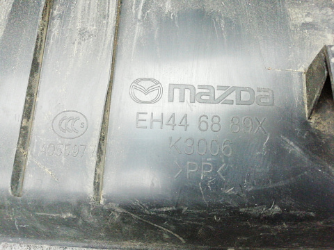 Фотография детали AA003570; Накладка задней панели внутренняя (EH44-68-89X) для Mazda CX-7/БУ; Оригинал; Р0, Хорошее; . Фото номер 7