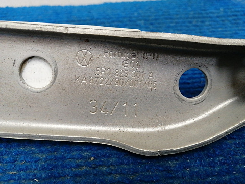 Фотография детали AA030235; Петля капота левая (6R0 823 301 A) для Volkswagen Polo/БУ; Оригинал; Р0, Хорошее; . Фото номер 2