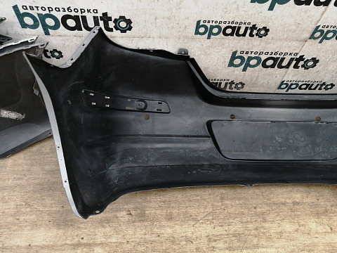 Фотография детали AA036121; Бампер задний; под паркт. (85022-EM00H) для Nissan Tiida/БУ; Оригинал; Р1, Мелкий дефект; . Фото номер 12