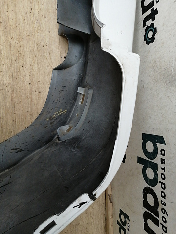 Фотография детали AA042870; Бампер задний; без паркт. (8200916804) для Renault Logan I рест. (2009-2015)/БУ; Оригинал; Р1, Мелкий дефект; . Фото номер 13