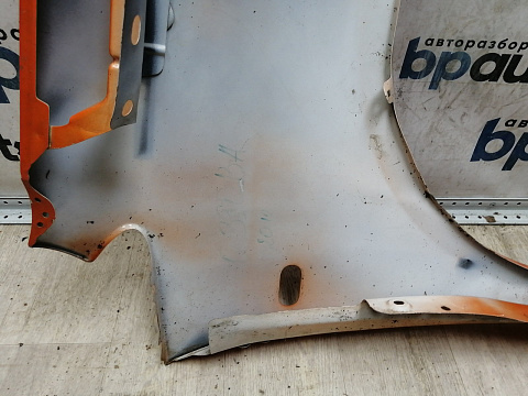 Фотография детали BA000286; Крыло переднее левое (2K0821021) для Volkswagen Caddy III (2004-2010)/БУ; Оригинал; Р2, Удовлетворительное; . Фото номер 19