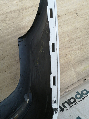 Фотография детали AA042870; Бампер задний; без паркт. (8200916804) для Renault Logan I рест. (2009-2015)/БУ; Оригинал; Р1, Мелкий дефект; . Фото номер 18