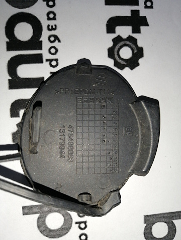 Фотография детали AA045047; Заглушка букс. крюка переднего бампера (13179944) для Opel Corsa/БУ; Оригинал; Р0, Хорошее; . Фото номер 4