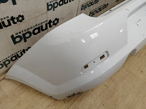 Фотография детали AA042870; Бампер задний; без паркт. (8200916804) для Renault Logan I рест. (2009-2015)/БУ; Оригинал; Р1, Мелкий дефект; . Фото номер 10