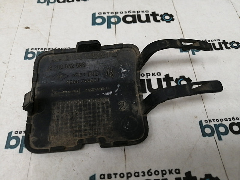 Фотография детали AA032451; Заглушка буксир. крюка переднего бампера (8200052598) для Renault Sandero I (2009-2014)/БУ; Оригинал; Р0, Хорошее; . Фото номер 2