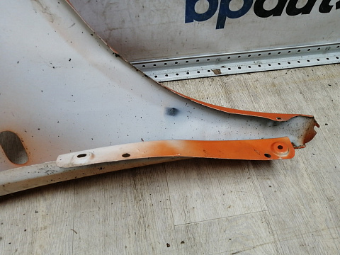 Фотография детали BA000286; Крыло переднее левое (2K0821021) для Volkswagen Caddy III (2004-2010)/БУ; Оригинал; Р2, Удовлетворительное; . Фото номер 20