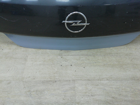 Фотография детали AA009651; Крышка багажника (93178817) для Opel Astra/БУ; Оригинал; Р1, Мелкий дефект; . Фото номер 6