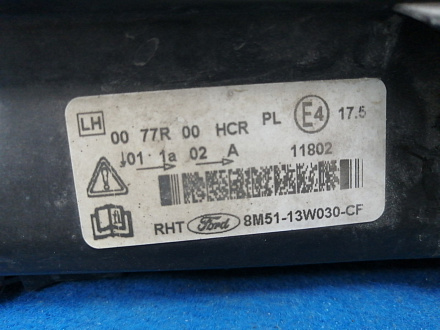 AA018914; Фара галоген левая, темный отражатель (8M51-13W030-CF) для Ford Focus/БУ; Оригинал; Р1, Мелкий дефект; 