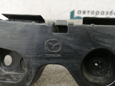 Фотография детали AA008098; Кронштейн заднего бампера левый (KD53502J1) для Mazda CX-5/БУ; Оригинал; Р0, Хорошее; . Фото номер 3