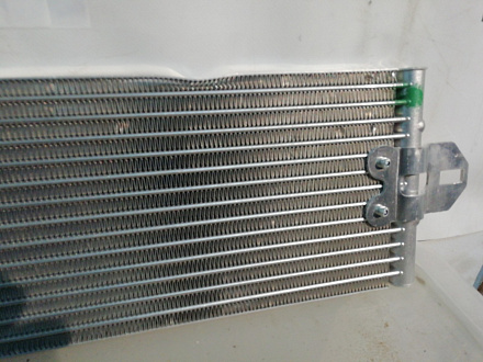 AA023455; Радиатор охлаждения масла АКПП (7L0 317 021)/Нов с деф; Оригинал; Р1, Мелкий дефект; 