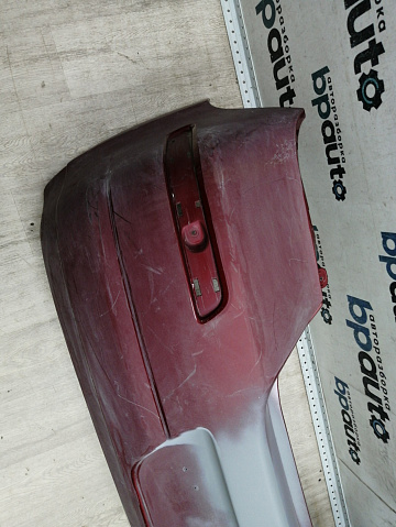 Фотография детали AA044693; Бампер задний; без паркт. (85022-EM00H) для Nissan Tiida/БУ; Оригинал; Р1, Мелкий дефект; . Фото номер 4